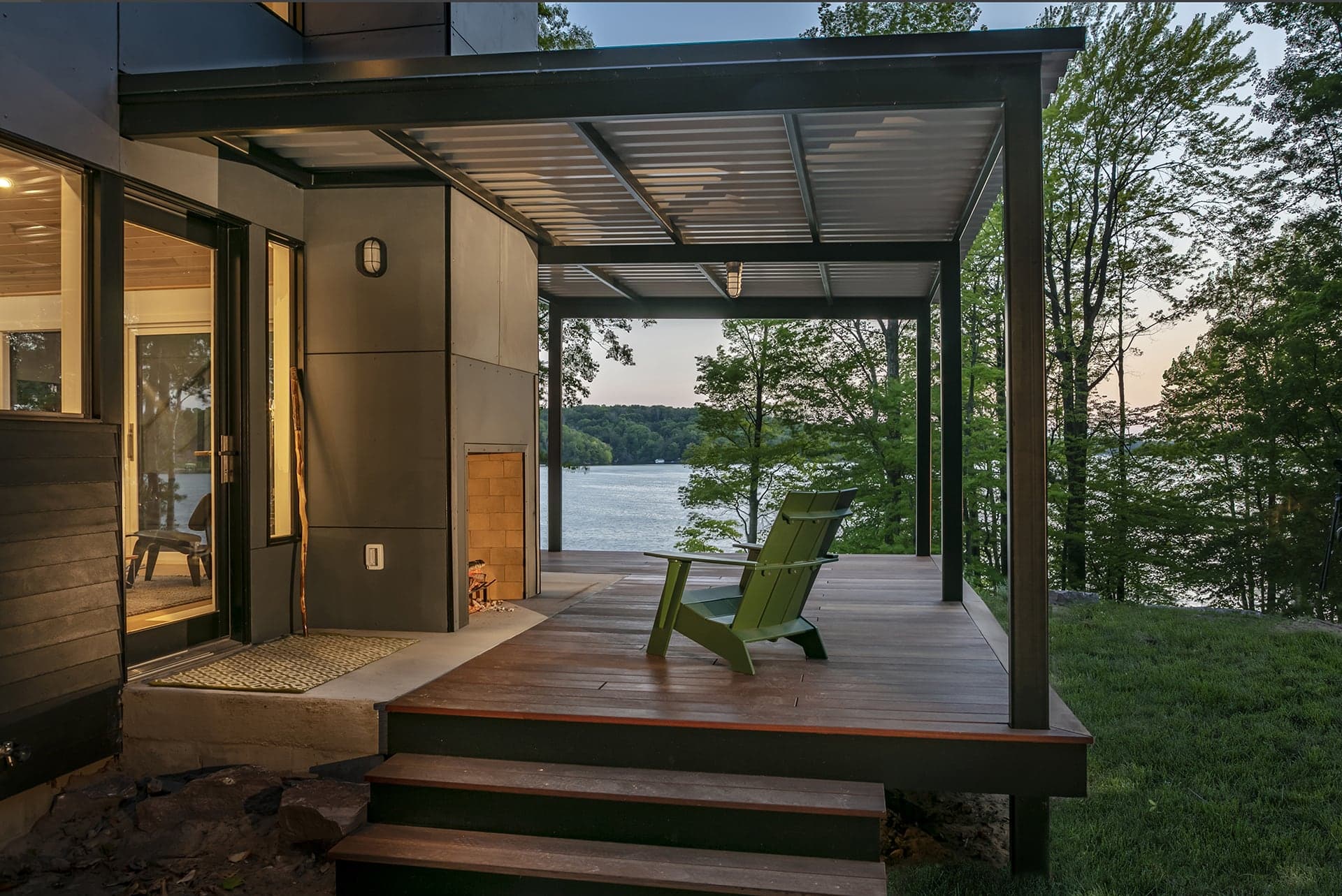 Hamlin Lake covered outdoor living room with a grand fireplace